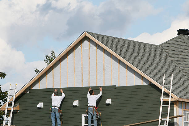 Professional Siding Contractor technician working in Arona, PA